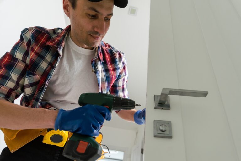 Worker Replacing House Door High